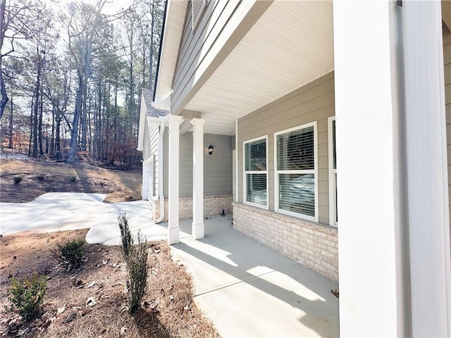 view of patio featuring a porch