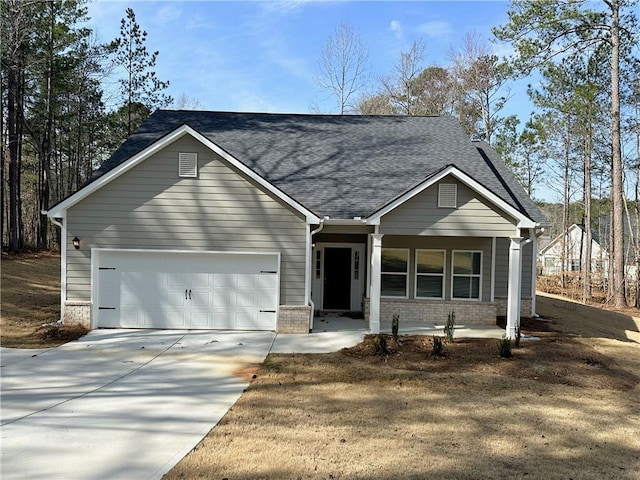 view of front of property with an attached garage, brick siding, driveway, and a shingled roof