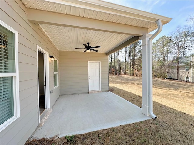 view of patio featuring ceiling fan