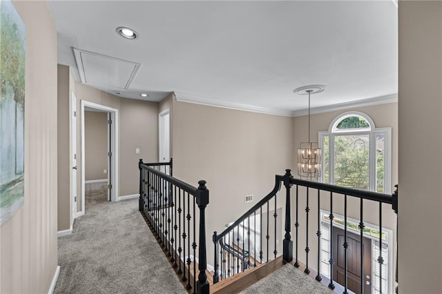 4648 Glenshire Pl, Atlanta, GA 30338 - corridor featuring an upstairs landing, attic access, baseboards, carpet, and a chandelier