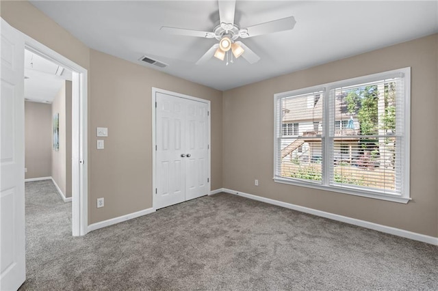 4648 Glenshire Pl, Atlanta, GA 30338 - unfurnished bedroom with carpet floors, baseboards, and a closet