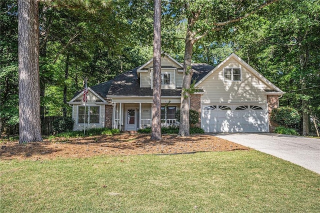 2130 Hampton Trl SE, Conyers, GA 30013 - view of front of house featuring driveway, a garage, brick siding, and a front yard