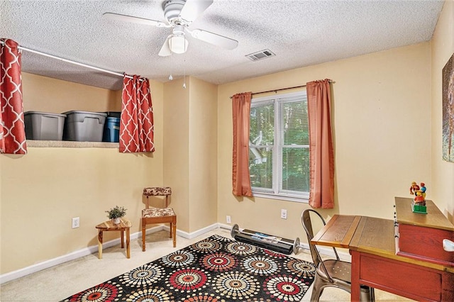 2130 Hampton Trl SE, Conyers, GA 30013 - home office featuring ceiling fan, a textured ceiling, and carpet