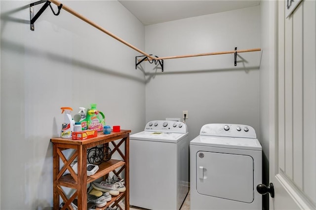 laundry area with washing machine and clothes dryer
