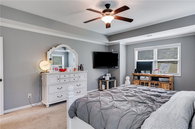bedroom featuring light colored carpet, baseboards, and ceiling fan