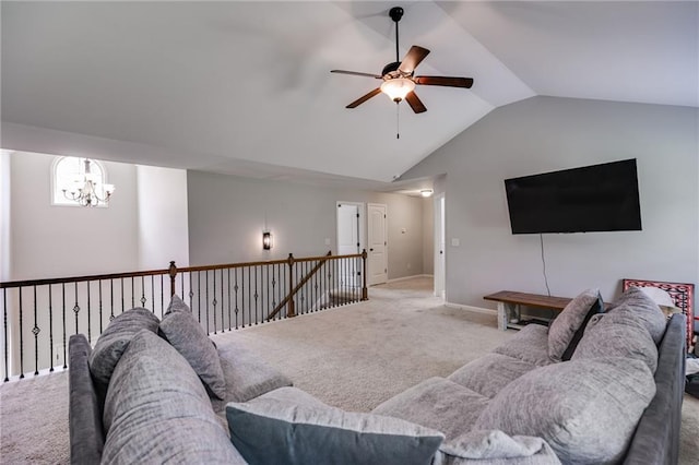 living room with carpet flooring, a chandelier, vaulted ceiling, a ceiling fan, and baseboards