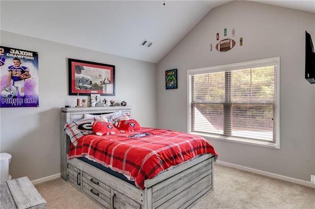 bedroom featuring light carpet, vaulted ceiling, and baseboards