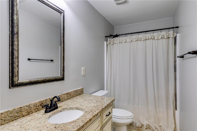 full bath featuring toilet, vanity, and shower / bath combination with curtain