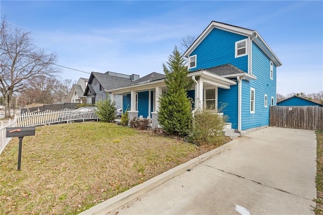 view of front of home featuring a porch and a front yard