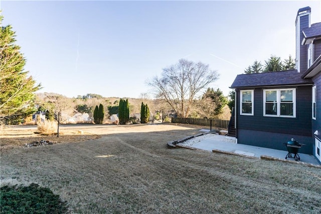 view of yard with a patio area and fence