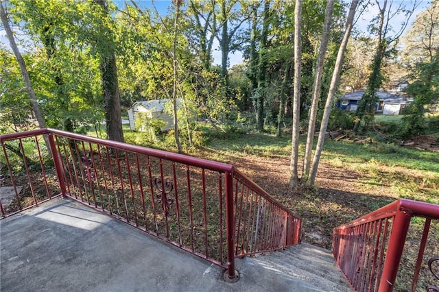 deck with a shed and an outdoor structure