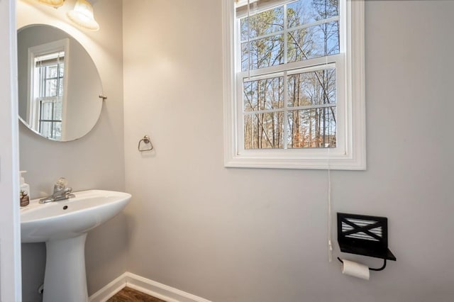 bathroom with a healthy amount of sunlight and sink