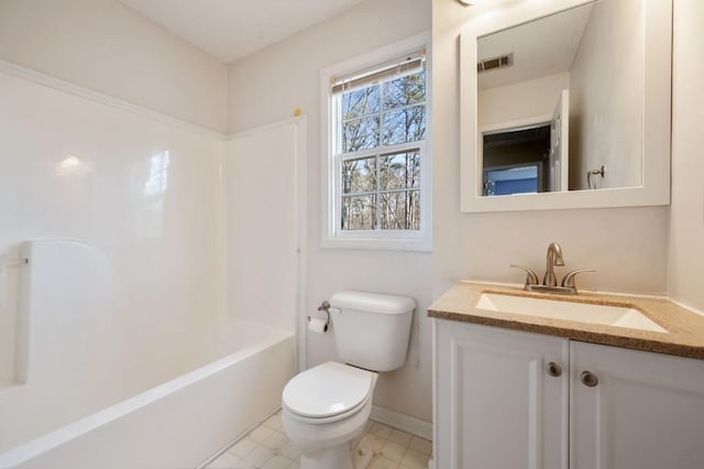 bathroom with baseboards, visible vents, toilet,  shower combination, and vanity