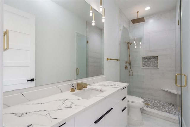 1678 Thomas Dr, Hoschton, GA 30548 - full bathroom with a shower stall, vanity, and toilet