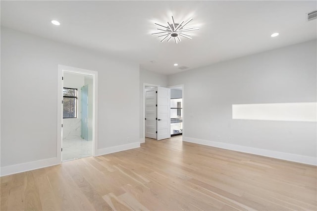 1678 Thomas Dr, Hoschton, GA 30548 - empty room with light wood-style flooring, recessed lighting, and baseboards