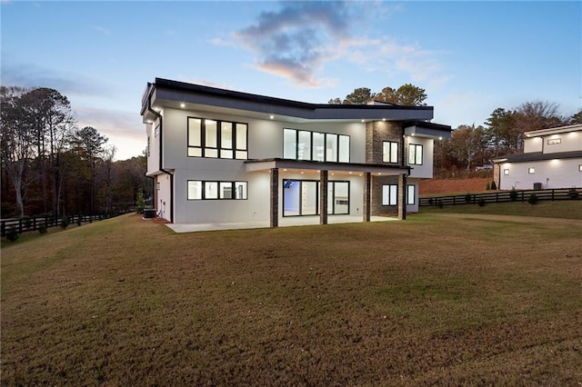1678 Thomas Dr, Hoschton, GA 30548 - rear view of property with a patio and stucco siding