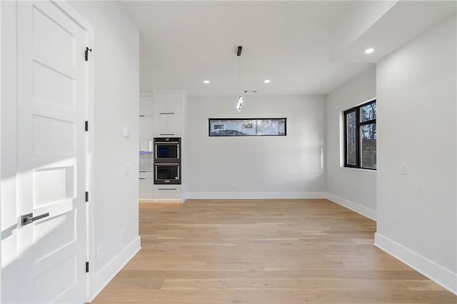 1678 Thomas Dr, Hoschton, GA 30548 - corridor featuring baseboards, recessed lighting, and light wood-style flooring