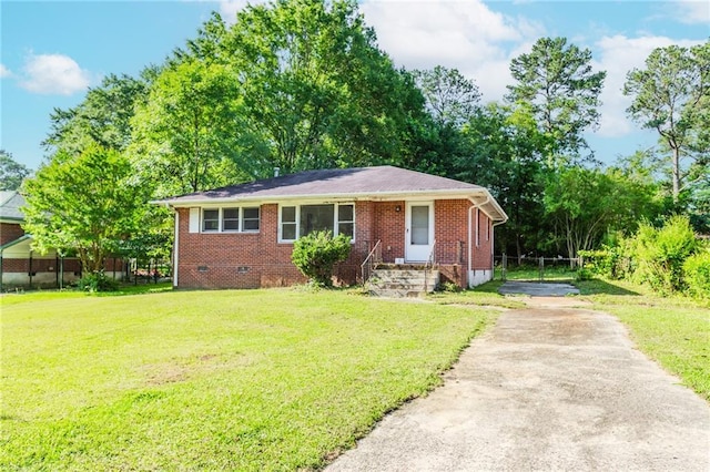 1167 Sanders Dr, Morrow, GA 30260 - view of front of home featuring brick siding, driveway, and crawl space