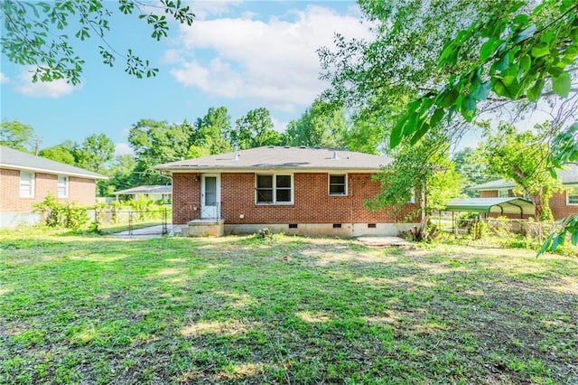1167 Sanders Dr, Morrow, GA 30260 - back of property with crawl space and a detached carport