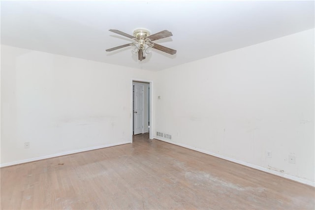1167 Sanders Dr, Morrow, GA 30260 - spare room with a ceiling fan, wood finished floors, and baseboards