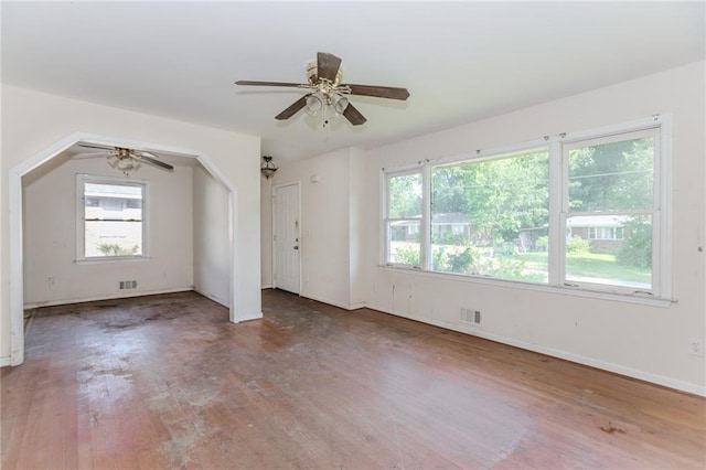 1167 Sanders Dr, Morrow, GA 30260 - unfurnished living room featuring a ceiling fan, wood finished floors, and baseboards