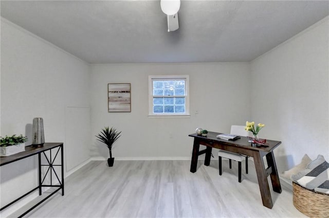 office space featuring light wood-style flooring and baseboards