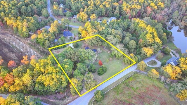 drone / aerial view with a view of trees