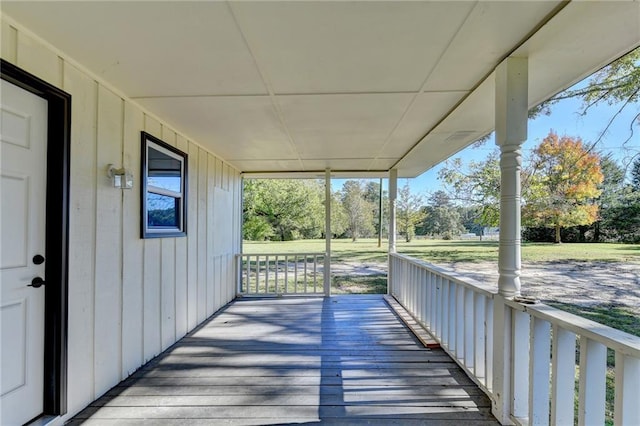 wooden terrace featuring a porch