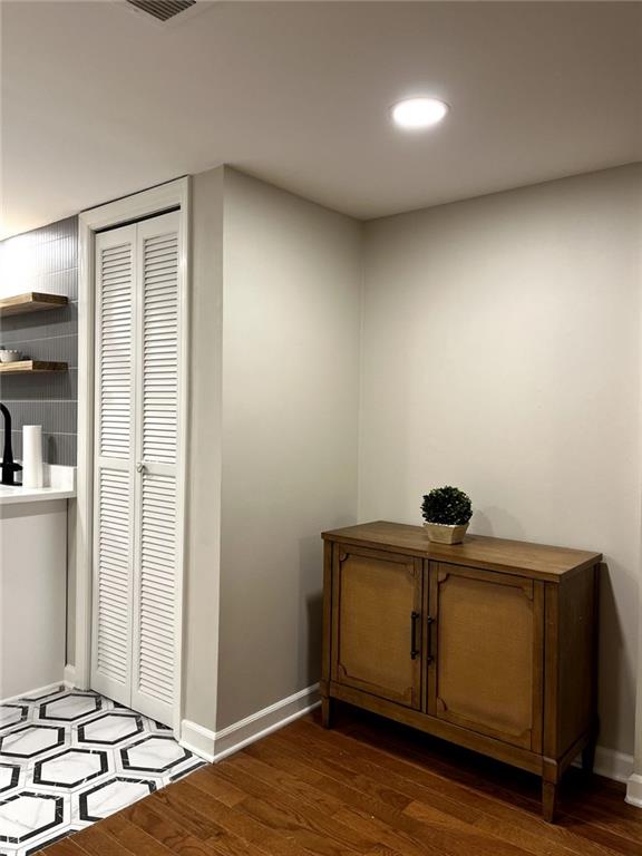 interior details featuring hardwood / wood-style floors