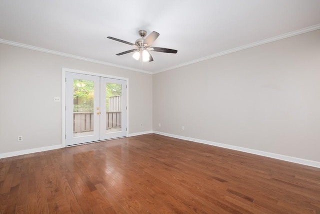 empty room featuring ceiling fan, wood-type flooring, ornamental molding, and french doors