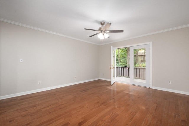 spare room with ceiling fan, crown molding, and hardwood / wood-style flooring