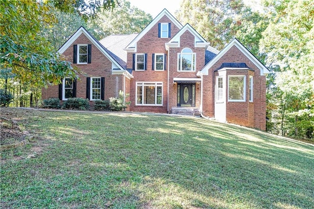 view of front of home with a front yard