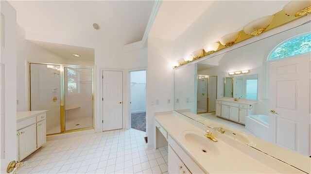 bathroom with vanity, plus walk in shower, and tile patterned floors