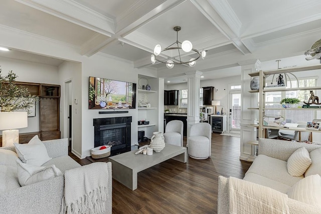 living room with a fireplace, coffered ceiling, dark wood-style flooring, ornamental molding, and beam ceiling