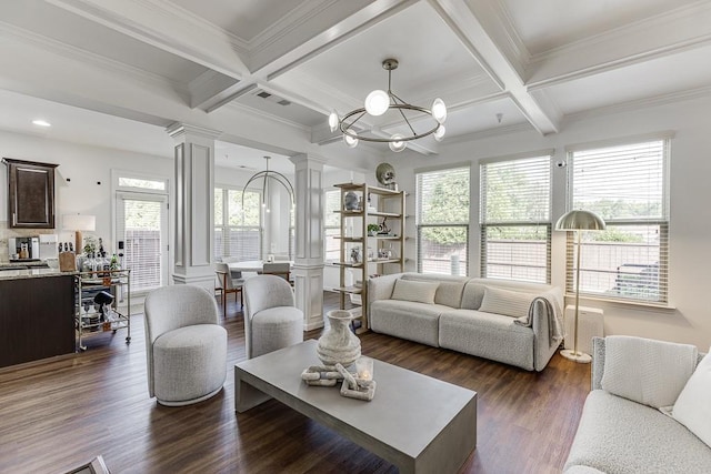 living area featuring ornate columns, coffered ceiling, dark wood-style floors, beam ceiling, and ornamental molding