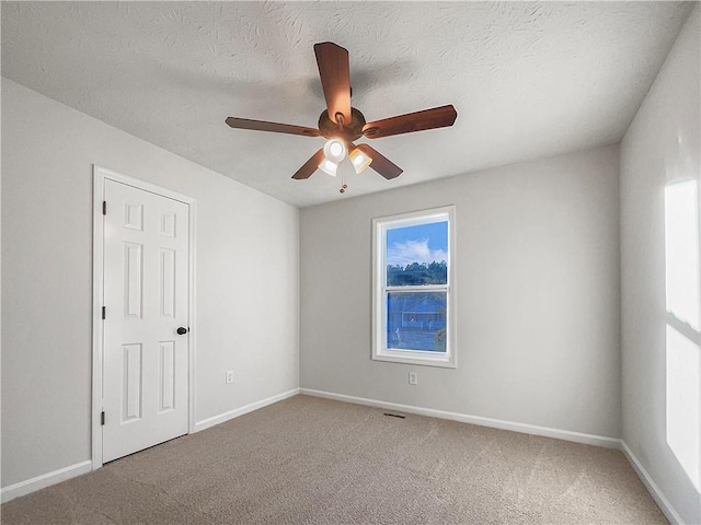 clothes washing area with washer hookup and a textured ceiling