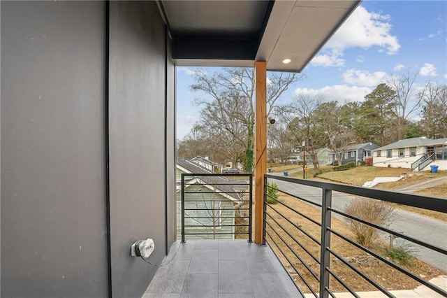 balcony featuring a residential view