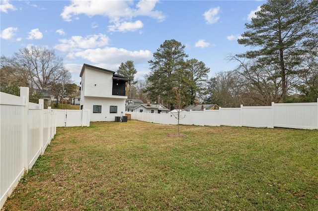 view of yard featuring a fenced backyard and cooling unit