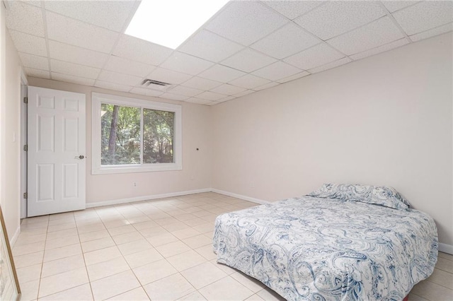 1402 Mclendon Dr, Decatur, GA 30033 - bedroom with light tile patterned floors and a drop ceiling