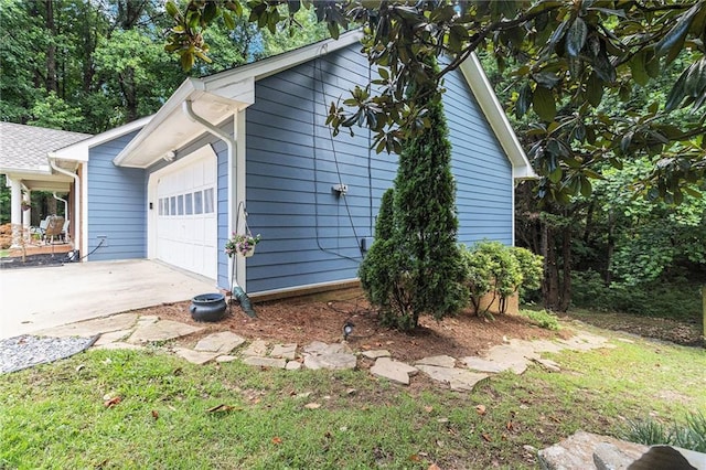 1402 Mclendon Dr, Decatur, GA 30033 - view of side of home with a garage and driveway