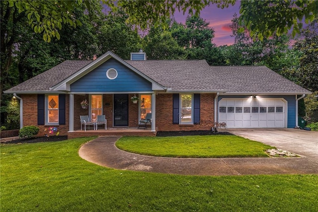 1402 Mclendon Dr, Decatur, GA 30033 - single story home with covered porch, driveway, a garage, and a front lawn