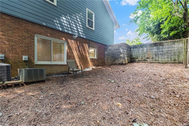 1402 Mclendon Dr, Decatur, GA 30033 - view of home's exterior with brick siding and a fenced backyard