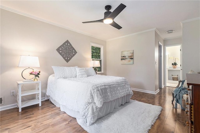 1402 Mclendon Dr, Decatur, GA 30033 - bedroom featuring crown molding, wood finished floors, and ceiling fan