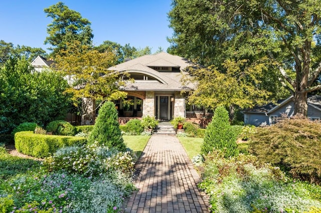 view of front of house with stone siding