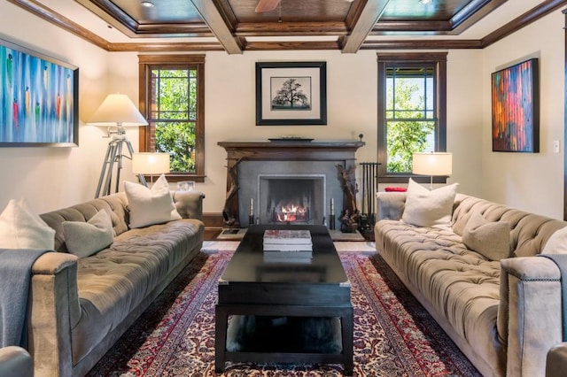 living room featuring a wealth of natural light, crown molding, and beamed ceiling