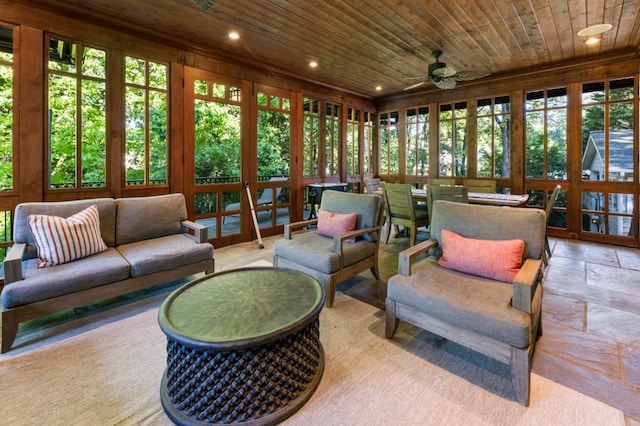 sunroom / solarium with wooden ceiling and ceiling fan