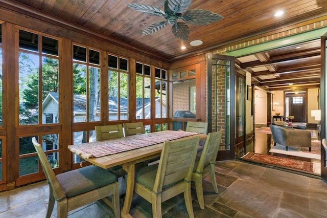 dining area featuring wooden ceiling, recessed lighting, a ceiling fan, stone tile flooring, and crown molding