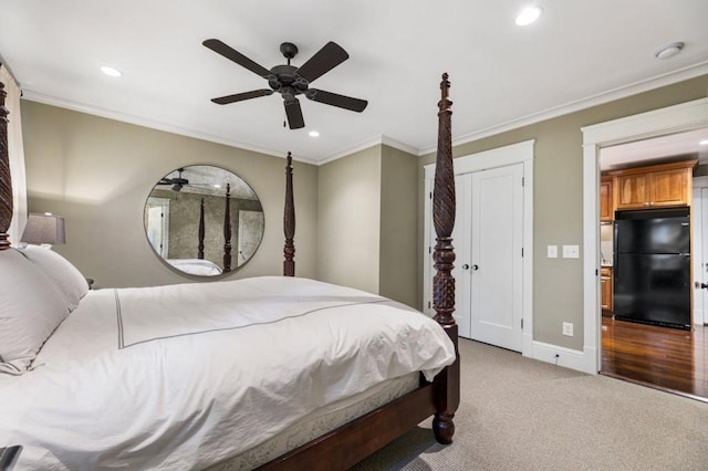 bedroom featuring recessed lighting, carpet floors, baseboards, freestanding refrigerator, and crown molding