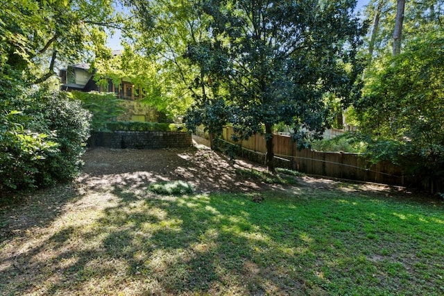 view of yard featuring fence