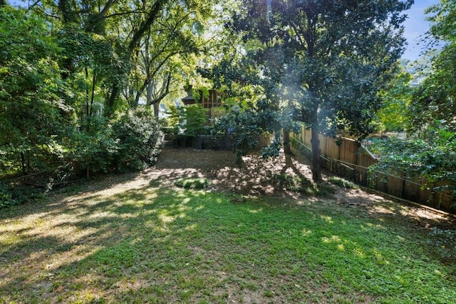 view of yard featuring fence